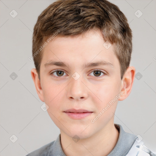 Joyful white child male with short  brown hair and brown eyes