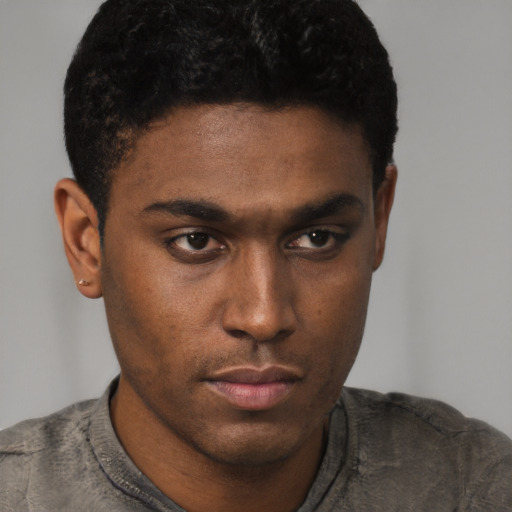 Neutral latino young-adult male with short  brown hair and brown eyes