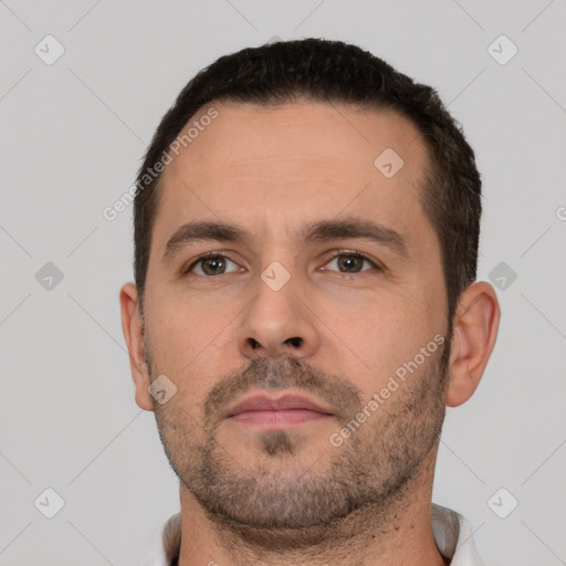 Neutral white adult male with short  brown hair and brown eyes