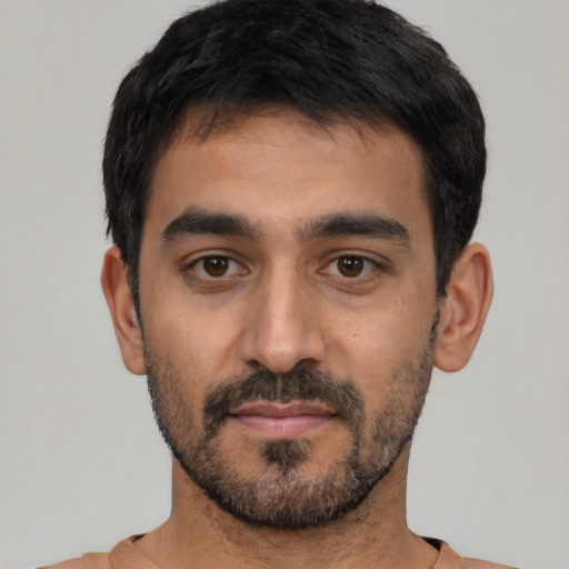 Neutral latino young-adult male with short  black hair and brown eyes