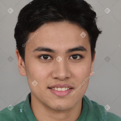 Joyful latino young-adult male with short  brown hair and brown eyes