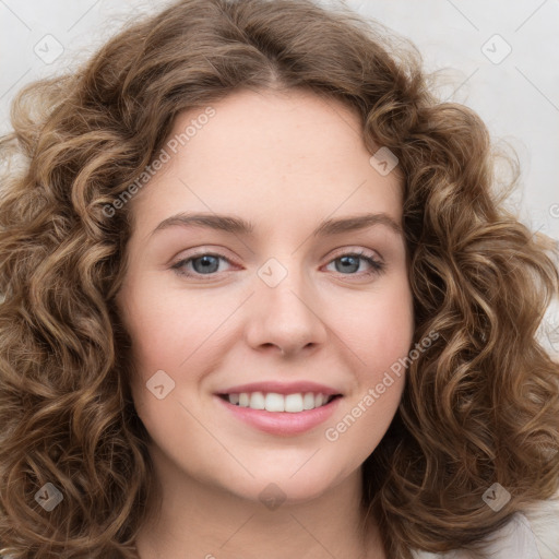 Joyful white young-adult female with long  brown hair and green eyes