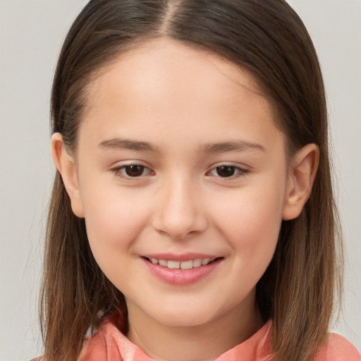 Joyful white child female with long  brown hair and brown eyes