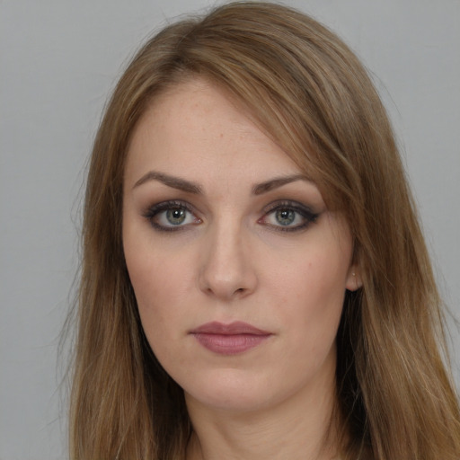 Neutral white young-adult female with long  brown hair and brown eyes