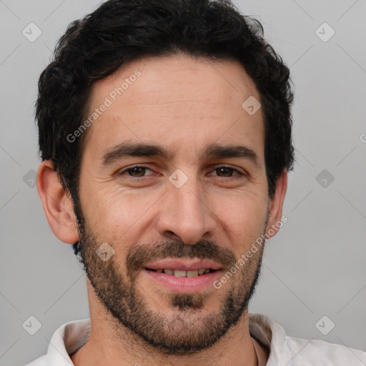 Joyful white young-adult male with short  black hair and brown eyes