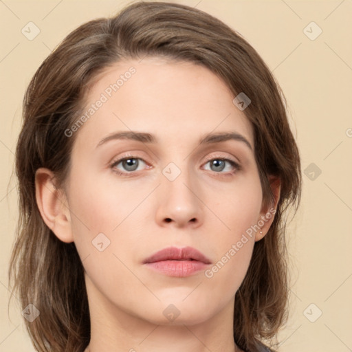 Neutral white young-adult female with medium  brown hair and green eyes