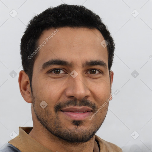 Joyful latino young-adult male with short  brown hair and brown eyes