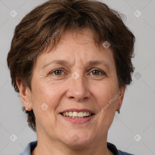 Joyful white adult female with short  brown hair and brown eyes