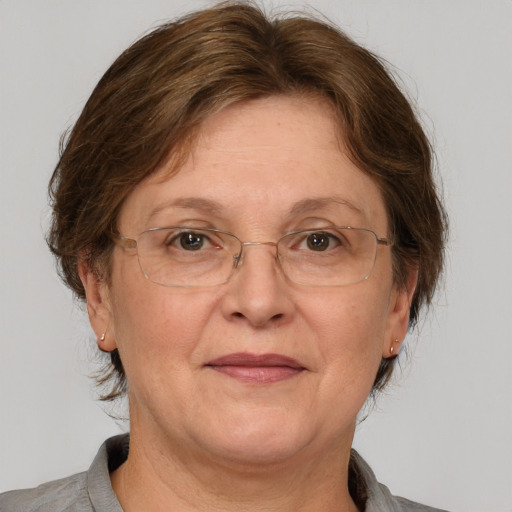 Joyful white middle-aged female with medium  brown hair and grey eyes