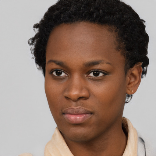 Neutral black young-adult female with short  brown hair and brown eyes