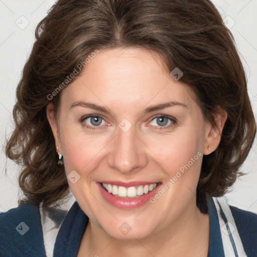 Joyful white young-adult female with medium  brown hair and blue eyes