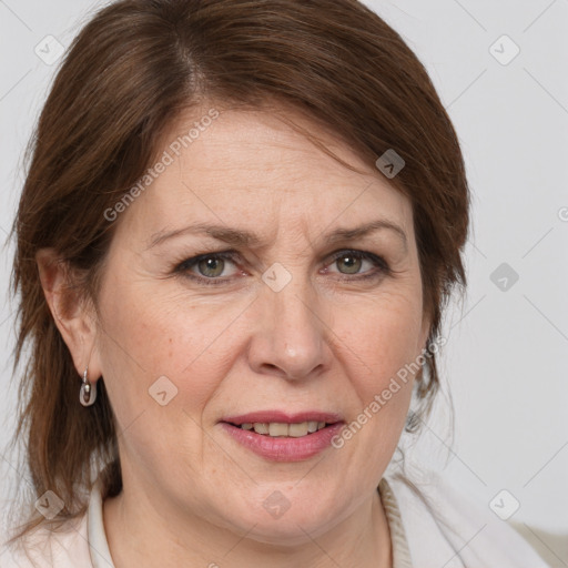 Joyful white adult female with medium  brown hair and grey eyes