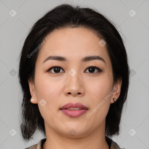 Joyful asian young-adult female with medium  black hair and brown eyes