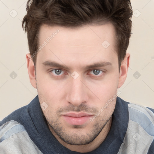 Neutral white young-adult male with short  brown hair and grey eyes