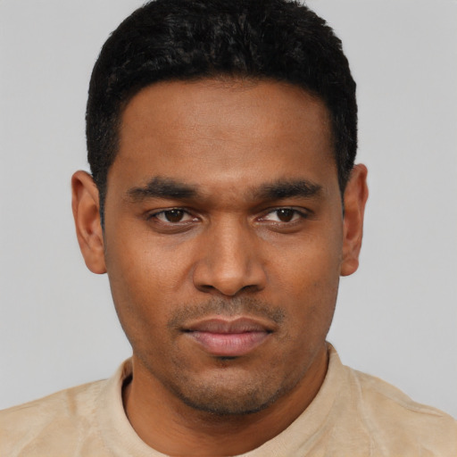Neutral black young-adult male with short  black hair and brown eyes