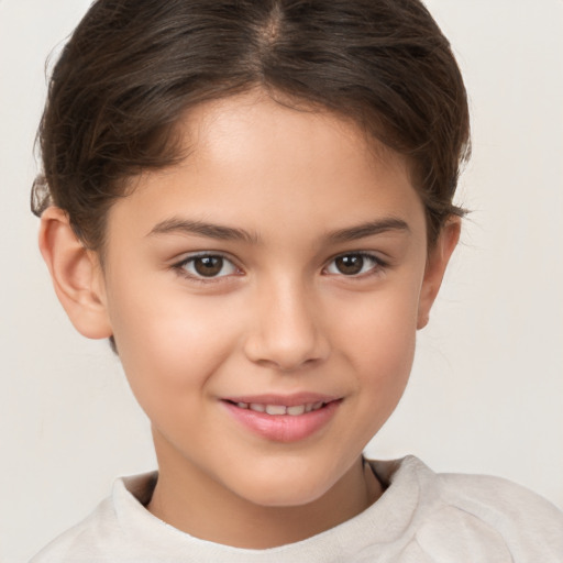 Joyful white child female with short  brown hair and brown eyes