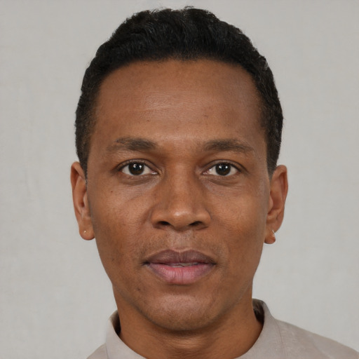 Neutral black adult male with short  brown hair and brown eyes