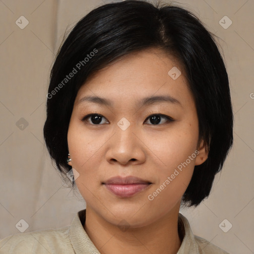 Joyful asian young-adult female with medium  black hair and brown eyes