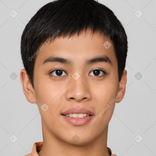 Joyful asian young-adult male with short  brown hair and brown eyes