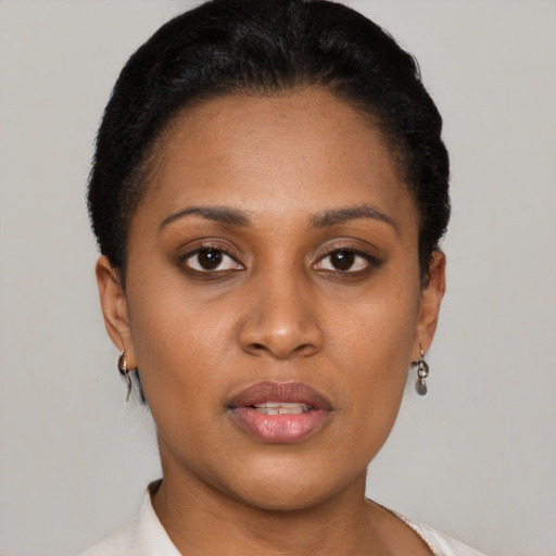 Neutral latino young-adult female with short  black hair and brown eyes