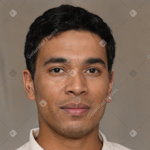 Neutral latino young-adult male with short  black hair and brown eyes