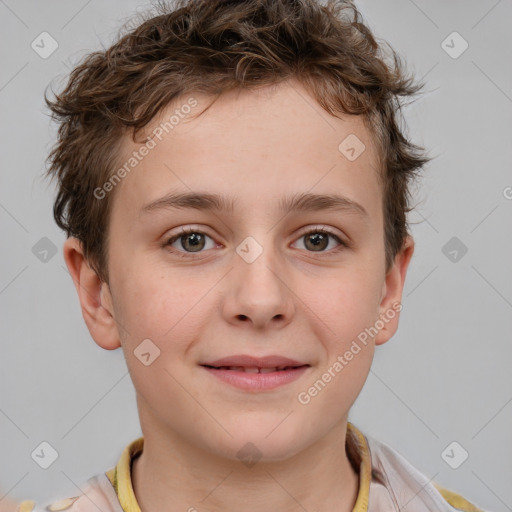 Joyful white child male with short  brown hair and brown eyes