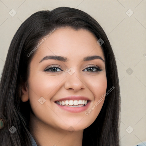 Joyful white young-adult female with long  black hair and brown eyes