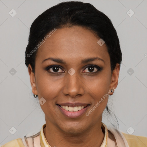 Joyful latino young-adult female with short  black hair and brown eyes