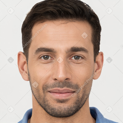 Joyful white young-adult male with short  brown hair and brown eyes