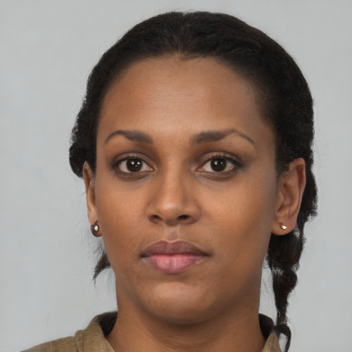 Neutral latino young-adult female with short  black hair and brown eyes
