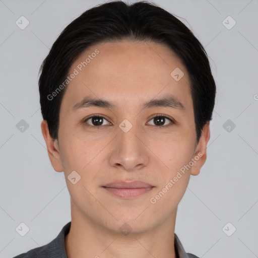 Joyful white young-adult male with short  black hair and brown eyes