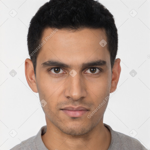 Neutral latino young-adult male with short  black hair and brown eyes