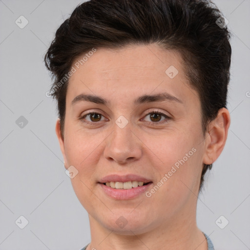 Joyful white young-adult female with short  brown hair and brown eyes