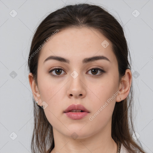 Neutral white young-adult female with medium  brown hair and brown eyes