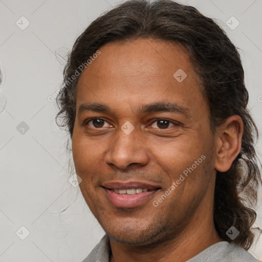 Joyful white young-adult male with medium  brown hair and brown eyes