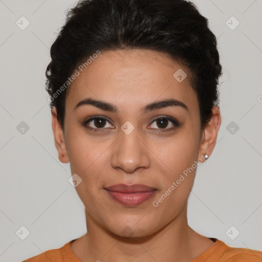 Joyful latino young-adult female with short  black hair and brown eyes