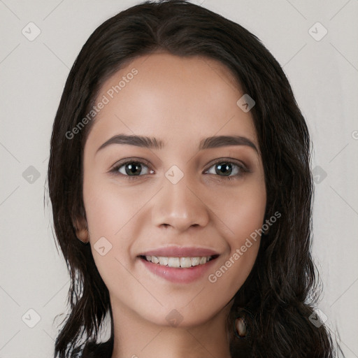 Joyful white young-adult female with long  black hair and brown eyes