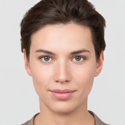 Neutral white young-adult female with short  brown hair and brown eyes