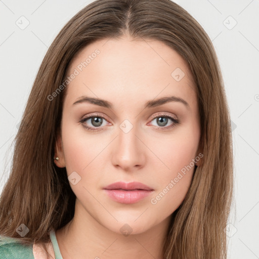 Neutral white young-adult female with long  brown hair and green eyes