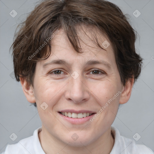 Joyful white adult female with short  brown hair and brown eyes