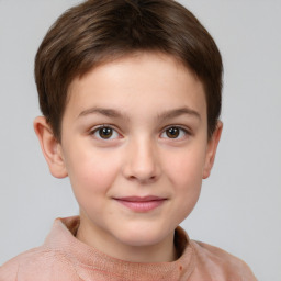 Joyful white child female with short  brown hair and brown eyes