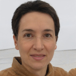 Joyful white adult female with short  brown hair and brown eyes