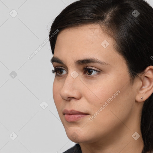 Neutral white young-adult female with medium  brown hair and brown eyes