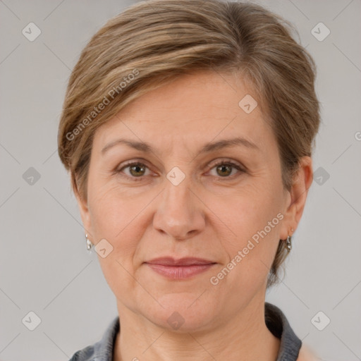 Joyful white adult female with medium  brown hair and grey eyes