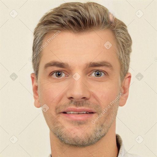 Joyful white adult male with short  brown hair and brown eyes