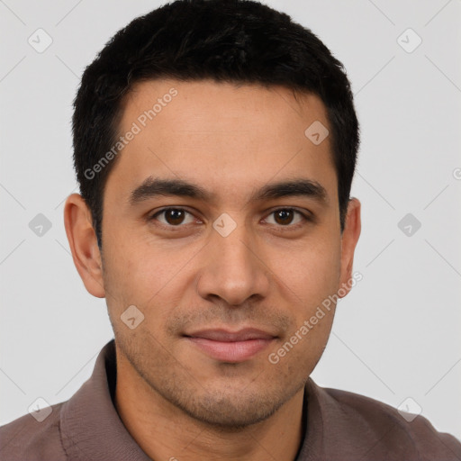 Joyful white young-adult male with short  black hair and brown eyes