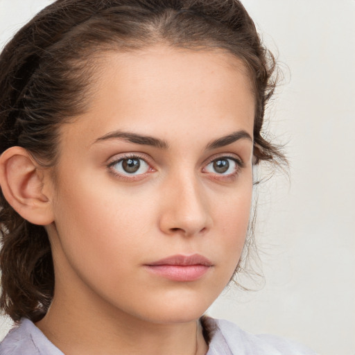 Neutral white young-adult female with medium  brown hair and brown eyes