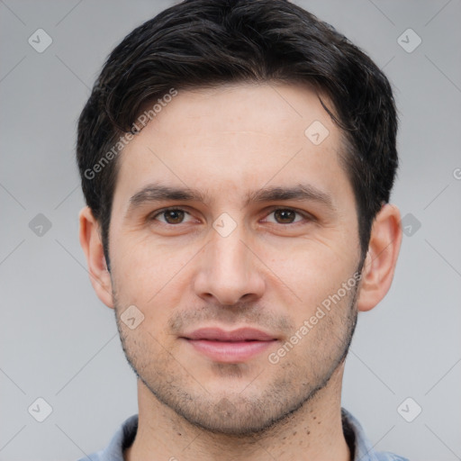 Joyful white young-adult male with short  brown hair and brown eyes