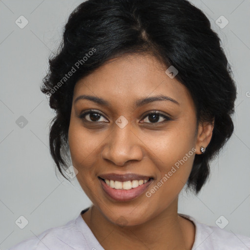 Joyful black young-adult female with medium  black hair and brown eyes