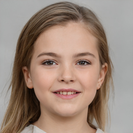 Joyful white child female with medium  brown hair and brown eyes